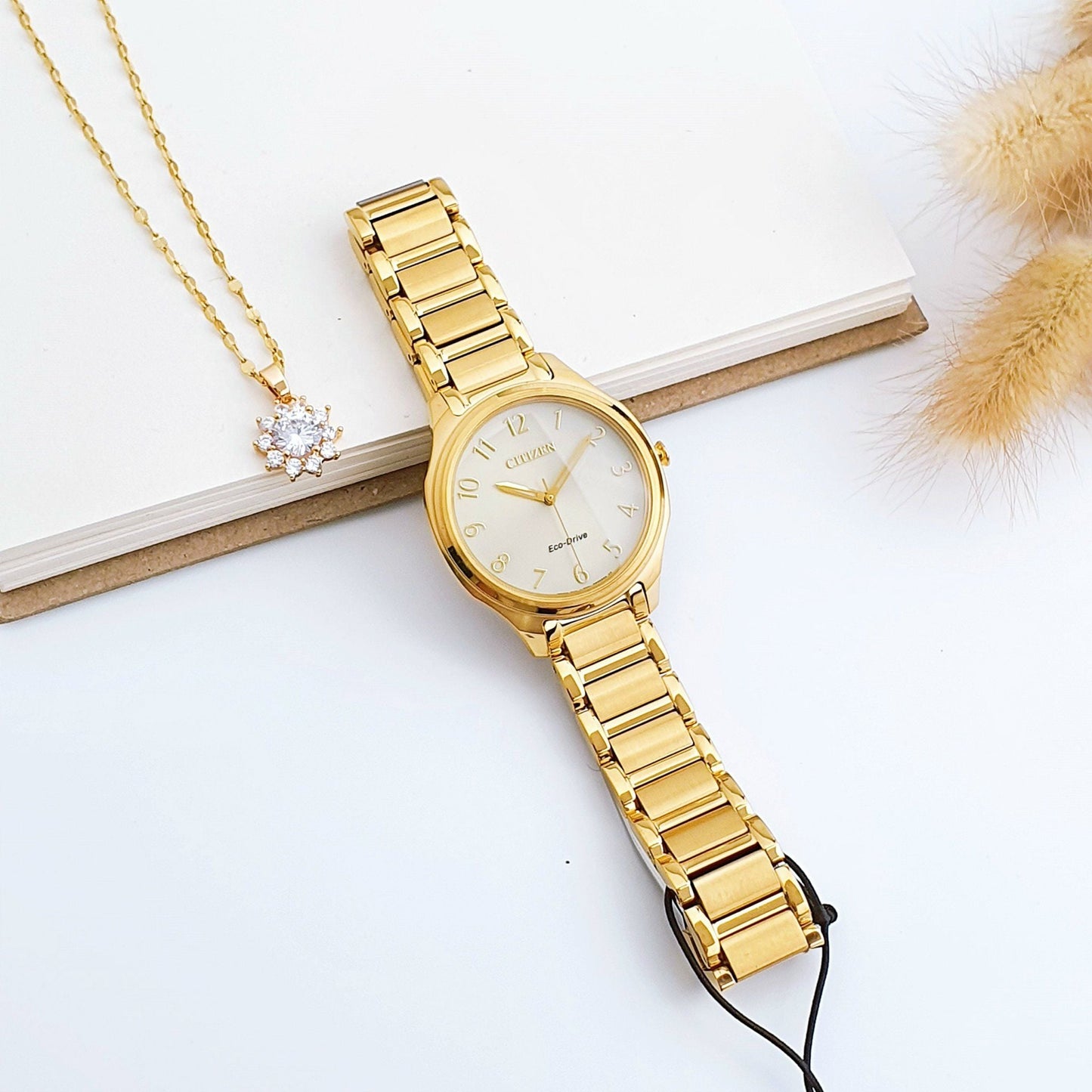 EM0752-54P Reloj Citizen Weekender de dama banda de metal Eco-drive